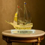 Golden Boat-Shaped Memento in Metal with Glass Base - Image 2
